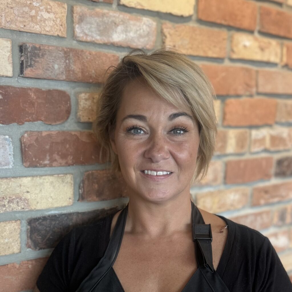 Eve, Cosmetologist at Heritage Club Barbershop in Tampa, FL