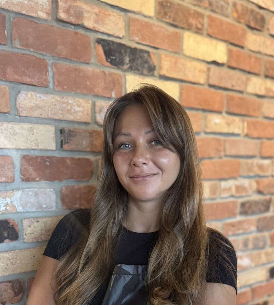 Ksenia, Barber at Heritage Club Barbershop in Tampa, FL